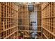 Custom-built wine cellar with ample storage for wine bottles at 11077 E Cinder Cone Trl, Scottsdale, AZ 85262