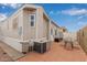 Cozy patio with table and chairs, plus storage shed at 111 S Greenfield Rd # 827, Mesa, AZ 85206