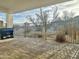 Outdoor patio with a scenic view of the desert landscape, wrought iron fence, and a built-in BBQ grill at 11429 S Wilson Ln, Goodyear, AZ 85338