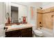 Single vanity bathroom with tile flooring and a tub at 13007 W Lowden Rd, Peoria, AZ 85383