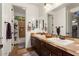 Double vanity bathroom with a large mirror and tile flooring at 13007 W Lowden Rd, Peoria, AZ 85383