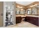 Elegant bathroom with double vanity and dark wood cabinets at 13007 W Lowden Rd, Peoria, AZ 85383