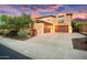 Two-story home with attached garage and attractive landscaping at 13007 W Lowden Rd, Peoria, AZ 85383