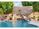 Stunning pool and waterfall feature in a lush backyard setting at 13007 W Lowden Rd, Peoria, AZ 85383