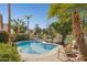 Landscaped backyard featuring a pool, view fencing and desert landscaping at 13248 N 12Th Pl, Phoenix, AZ 85022