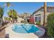 Backyard with a refreshing pool, desert landscaping, and privacy fencing at 13248 N 12Th Pl, Phoenix, AZ 85022