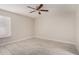 A bright bedroom with modern ceiling fan and neutral paint at 1342 W Emerald Ave # 344, Mesa, AZ 85202