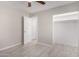 Well-lit bedroom with doors to closet and hallway at 1342 W Emerald Ave # 344, Mesa, AZ 85202