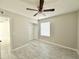 Spacious bedroom with tile floor and ceiling fan at 1342 W Emerald Ave # 344, Mesa, AZ 85202