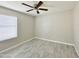 Bright bedroom with ceiling fan and tile flooring at 1342 W Emerald Ave # 344, Mesa, AZ 85202