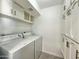 Laundry room with washer, dryer and storage at 1342 W Emerald Ave # 344, Mesa, AZ 85202