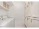 Large laundry room with full-sized washer and dryer, and ample storage at 1342 W Emerald Ave # 344, Mesa, AZ 85202