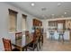 Dining area with table and chairs, adjacent to the kitchen at 13442 W Blackstone Ln, Peoria, AZ 85383