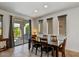 Dining area with sliding glass doors leading to the backyard at 13442 W Blackstone Ln, Peoria, AZ 85383