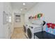 Laundry room with washer, dryer, and shelving for storage at 13442 W Blackstone Ln, Peoria, AZ 85383