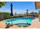 Inviting pool area with lounge chairs, landscaping, and a relaxing outdoor ambiance at 14615 N 28Th St, Phoenix, AZ 85032