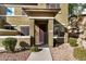 Front gated entry, covered porch, and front door at 15240 N 142Nd Ave # 1149, Surprise, AZ 85379