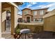 Private patio with sitting area and desert plants at 15240 N 142Nd Ave # 1149, Surprise, AZ 85379