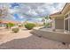 Well-maintained backyard with gravel landscaping, providing a serene outdoor space at 15704 W Sentinel Dr, Sun City West, AZ 85375