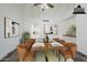 Virtually staged dining room with ample natural light, a modern light fixture and an open layout at 15857 N 51St Pl, Scottsdale, AZ 85254