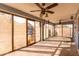 Bright sun room with glass sliders and lots of natural light at 1937 W Burgess Ln, Phoenix, AZ 85041