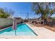 Inviting swimming pool with a spacious backyard and patio area at 2317 W W Whitton Ave Ave, Phoenix, AZ 85015