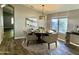 Elegant dining room featuring a round table and four chairs at 2342 W Blue Sky Dr, Phoenix, AZ 85085