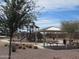 Community park playground with covered picnic benches at 24338 W Albeniz Pl, Buckeye, AZ 85326