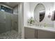 Contemporary bathroom with a sleek vanity and hexagon tile at 24923 N 91 St, Scottsdale, AZ 85255