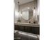 Elegant bathroom with modern vanity and large mirror at 24923 N 91 St, Scottsdale, AZ 85255