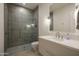 Modern bathroom with a walk-in shower and updated fixtures at 24923 N 91 St, Scottsdale, AZ 85255