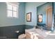 Chic bathroom with blue tile and modern vanity at 25453 N 113Th Way, Scottsdale, AZ 85255