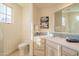 Spa-like bathroom with corner vanity and large mirror at 25453 N 113Th Way, Scottsdale, AZ 85255