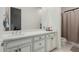 Bathroom with white shaker cabinets and quartz countertop at 2706 E Lovebird Ln, Gilbert, AZ 85297