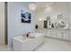 Spa-like Primary bathroom with soaking tub and dual vanity at 2706 E Lovebird Ln, Gilbert, AZ 85297