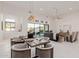 Bright dining area with modern furnishings and sliding glass doors at 2706 E Lovebird Ln, Gilbert, AZ 85297