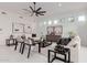 Bright living room with modern furniture and a view of the pool at 2706 E Lovebird Ln, Gilbert, AZ 85297