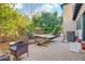 Relax in your private backyard oasis, complete with hammock and comfortable seating at 311 W Georgia Ave, Phoenix, AZ 85013