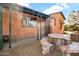 Beautiful patio with brickwork and artistically crafted table and benches at 311 W Georgia Ave, Phoenix, AZ 85013