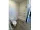 Clean bathroom with a tub, toilet, and wood-look flooring at 320 E Mckellips Rd # 50, Mesa, AZ 85201