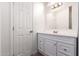 Bright bathroom features white vanity, ample storage, and a large mirror at 320 E Mckellips Rd # 50, Mesa, AZ 85201