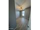 Bright bedroom featuring wood-look floors and ceiling fan at 320 E Mckellips Rd # 50, Mesa, AZ 85201