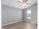 Bedroom with a ceiling fan and natural light from a window at 320 E Mckellips Rd # 50, Mesa, AZ 85201