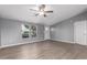 Bright living room features neutral color palette, ceiling fan and lots of natural light at 320 E Mckellips Rd # 50, Mesa, AZ 85201