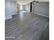 Spacious living room with gray walls and wood-look flooring at 320 E Mckellips Rd # 50, Mesa, AZ 85201