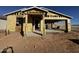 Exterior view of a home under construction, showing the framing and some plywood sheathing, and attached garage at 32693 N Newby Dr, San Tan Valley, AZ 85143