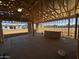 Interior view of a home under construction, framing and ceiling with an unfinished slab floor at 32693 N Newby Dr, San Tan Valley, AZ 85143