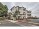 Beautiful multi-story apartment building featuring neutral tones, balconies, and well-maintained landscaping at 3302 N 7Th St # 249, Phoenix, AZ 85014