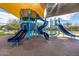 Community playground with slides, climbing structures, and shade coverings for sunny days at 3320 E Tina Dr, Phoenix, AZ 85050