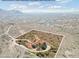 Aerial view showcasing home, expansive lot, and mountain views at 37020 N 31St Ave, Phoenix, AZ 85086